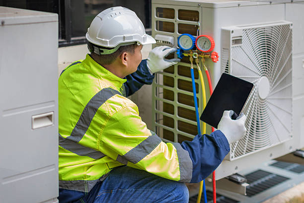 Professional Heat Pump Repair technician working in Campbell, MO